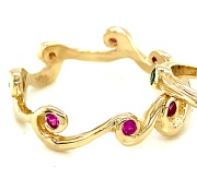 14k gold and pink sapphire wave ring